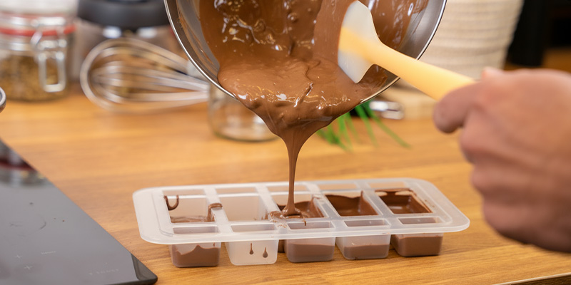 Pour the chocolate into a mould, let it set, then store it in an airtight container in the fridge