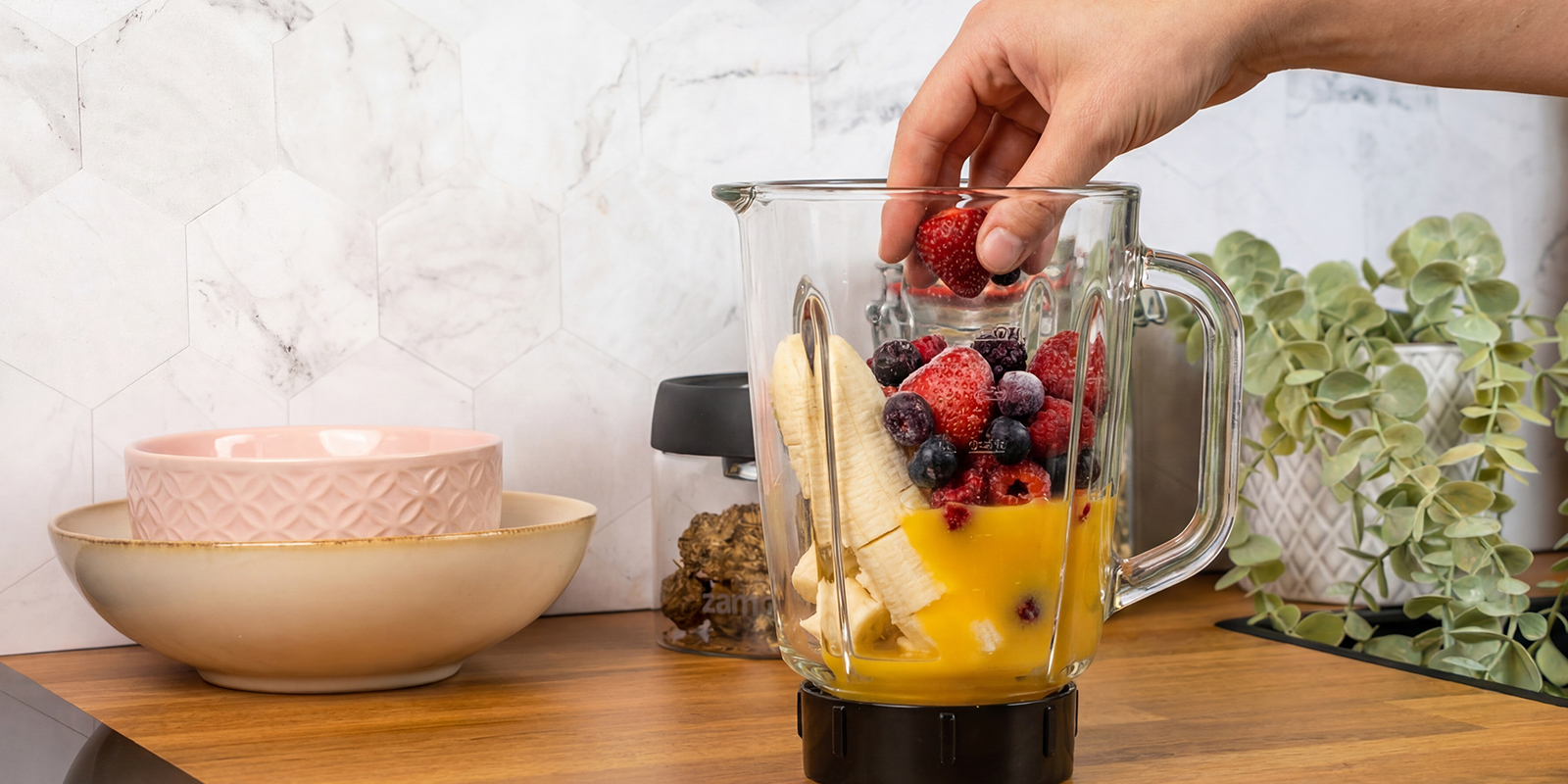 Add fruit to the blender